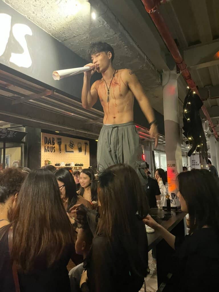 Dab haus, coffee shop, China, Shenzhen, aPark, Halloween, fancy dress, man standing, costumes